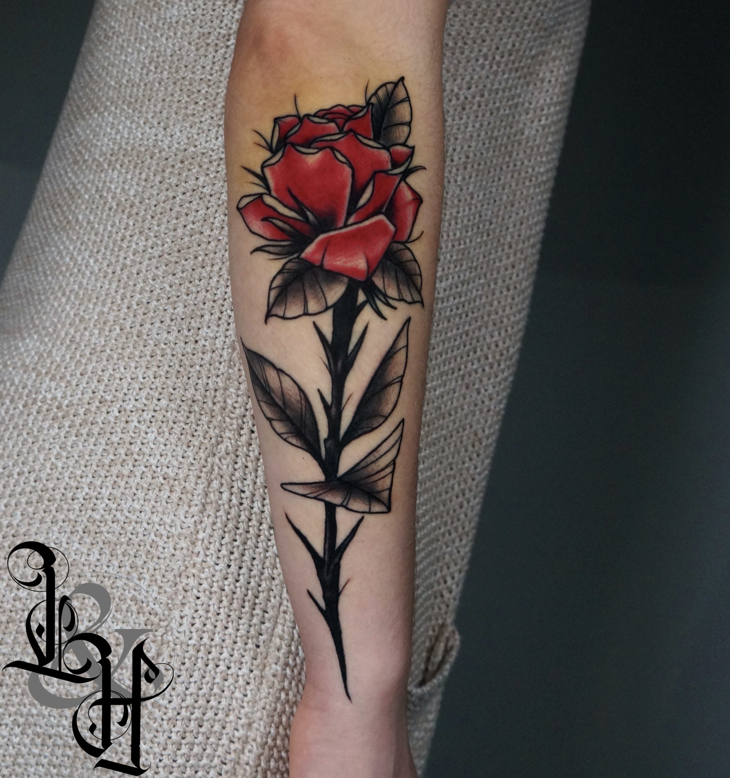 red rose with stem tattoo