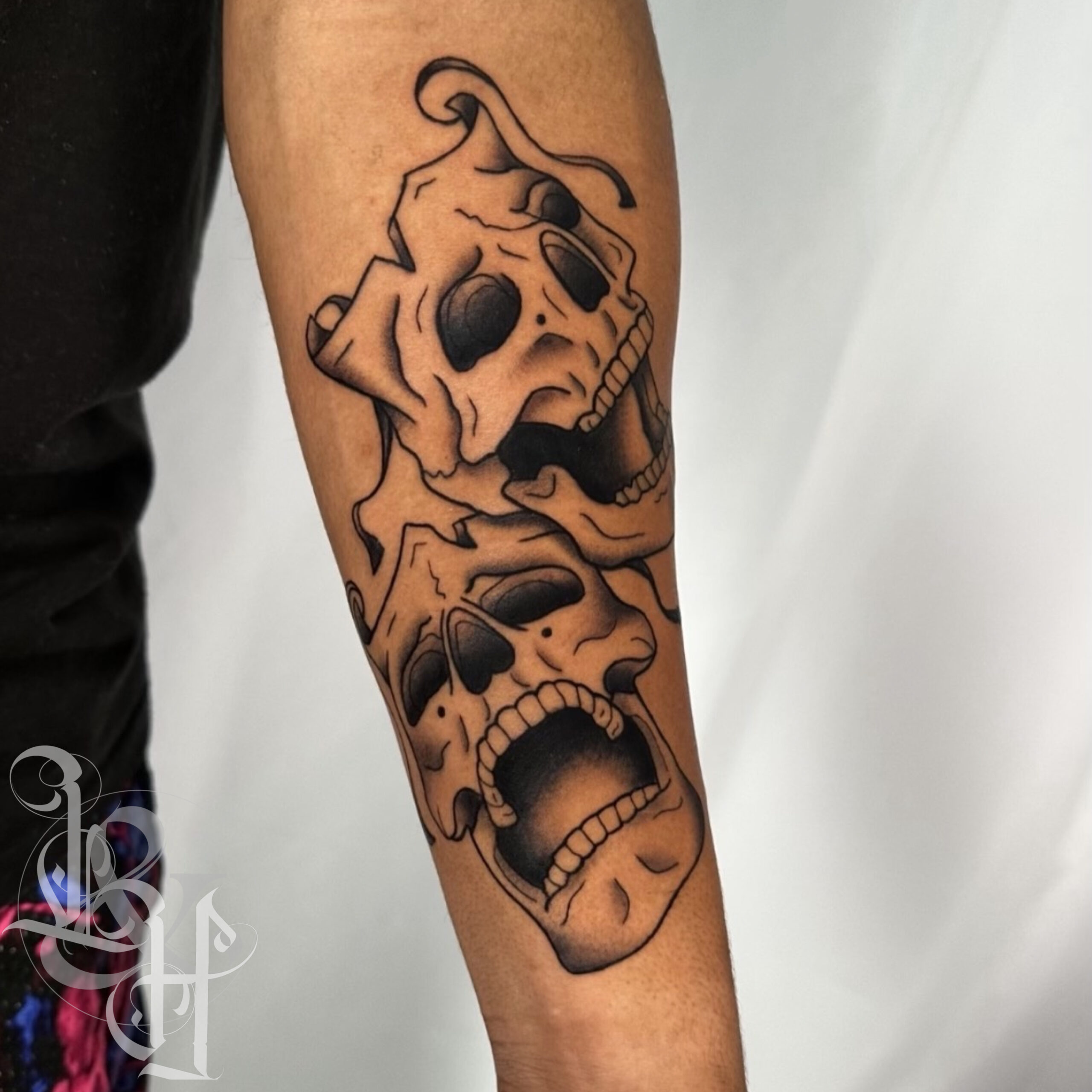 skeleton man tattoo smiling